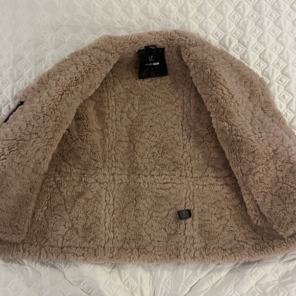 Faux black leather jacket
Seems more like a large. - Picture 3 of 7